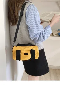 Japanese lightweight casual commuter shoulder bag yellow cylinder handbag for women.