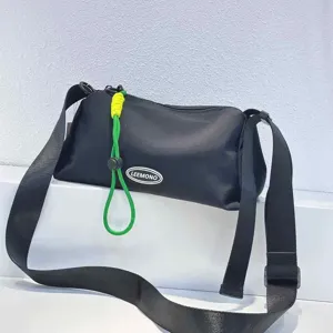 Casual black nylon crossbody bag with green rope detail, stylish women shoulder bag for daily use.