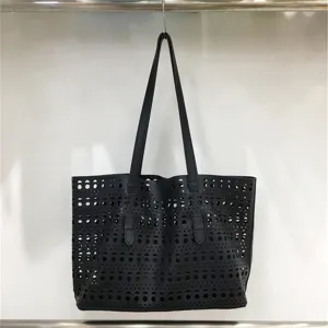 Stylish black hollow-out tote bag for women, large capacity shoulder and handbag for daily use.