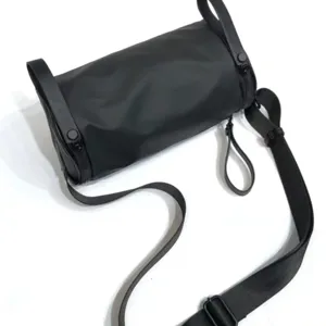 Black waterproof nylon cylinder crossbody bag minimalist dark style everyday shoulder bag