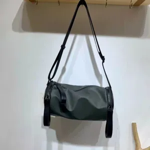 Dark green nylon cylindrical shoulder crossbody bag for daily casual students use and travel