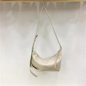 Soft leather dumpling hobo bag detail view minimalist underarm style for daily commuting use