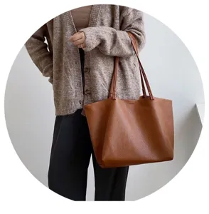 Soft brown slouchy tote bag, minimalist shoulder handbag, casual retro daily style accessory.