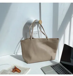Soft minimalist tote shoulder bag in beige, versatile retro casual underarm bag for daily use.