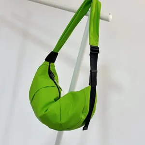 Japanese style green nylon crossbody dumpling bag, casual minimalist shoulder moon bag.