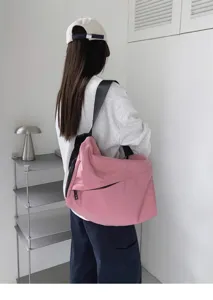 Japanese minimalist pink canvas crossbody bag, large capacity single shoulder tote for casual daily use.