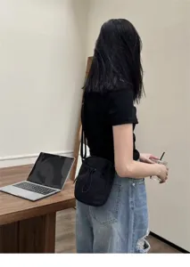 Japanese minimalist black nylon crossbody bag, lightweight casual phone shoulder bag.