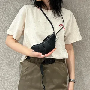 Black soft leather croissant crossbody bag, cute mini dumpling coin purse with vintage strap.
