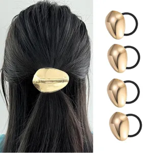 Gold metal oval hair tie set for women, elegant hair accessories for styling ponytails.