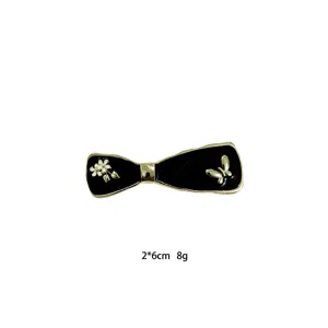 Black bow hair clip with white flower and golden butterfly, elegant side clip size 2x6cm.