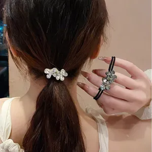 Crystal flower hair tie elastic rubber band fashion hair accessories for women and girls.