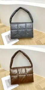 Quilted puffer shoulder bag set, soft padded down fabric underarm bag with thick strap details.