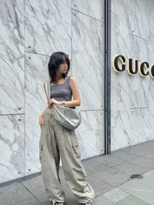 Casual large capacity silver crescent shoulder bag for women, stylish waterproof crossbody bag.