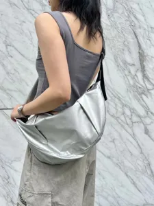 Silver crescent shoulder bag, casual large capacity crossbody dumpling bag for daily use.
