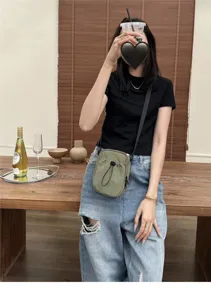 Minimalist nylon cross-body phone bag for men and women, lightweight casual daily shoulder bag.