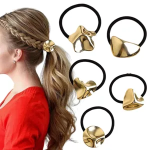 Metal geometric hair ties set with irregular gold charms and elastic black bands for women.
