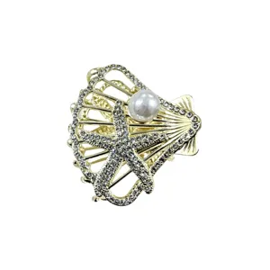 Elegant gold rhinestone seashell hair claw clip with pearl, sparkling crystal shark clip for women.