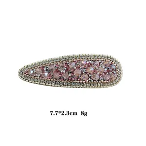 Sparkling rhinestone BB hair clip, sweet pink crystal design, elegant hair accessory detail.