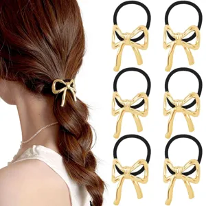 Gold metal bow hair tie detail, elegant ponytail hair accessory with elastic band for styling.