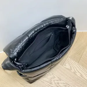 Black puffer shoulder bag for women, quilted cloud handbag, stylish casual underarm tote bag.