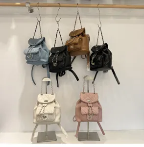 Quilted chain mini backpack set, stylish daily casual faux leather and denim travel daypack.