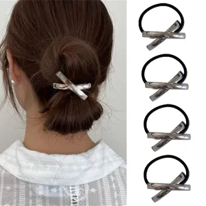 Silver cross metal hair tie set, elegant ponytail holder and bun cuff for women daily wear.