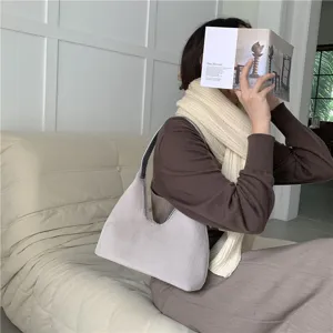 Stylish plush hobo bag for women, soft fuzzy underarm shoulder purse for autumn and winter fashion.