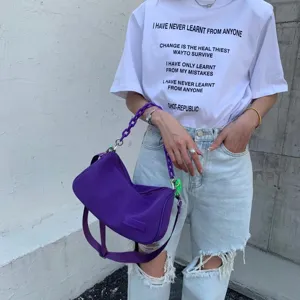 Purple canvas underarm shoulder bag with chain strap, daily commute fashion detail.
