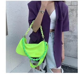 Neon green canvas shoulder bag with chunky chain and braided strap for women summer fashion.
