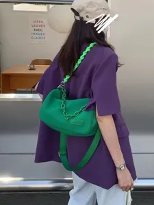 Stylish green canvas underarm shoulder bag with chunky chain strap for women commute and daily.