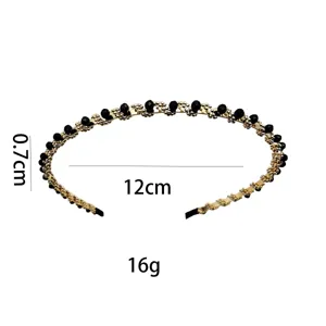 Elegante diadema de cuentas negras y doradas, accesorio para el pelo estilo vintage.