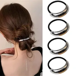Detailed view of metal-accented elastic hair ties, showing the texture and stylish design.