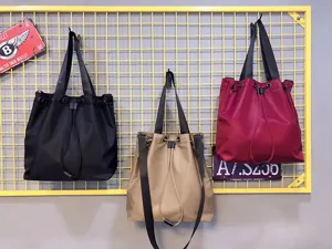 Large capacity nylon tote shoulder bag, casual bucket bag with drawstring closure for women.