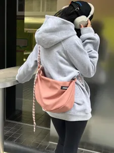 Waterproof oxford cloth crossbody dumpling bag for women, stylish large capacity shoulder bag.