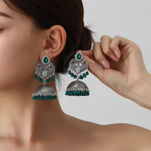 Ethnic bohemian carved green stone tassel jhumka earrings detail view for women jewelry
