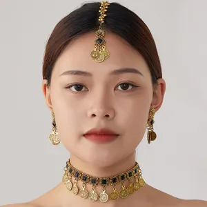 Close-up detail of vintage bohemian coin choker necklace and matching ethnic jewelry set.