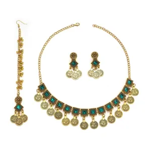 Bohemian ethnic style gold necklace earrings and maang tikka set with green square stones.