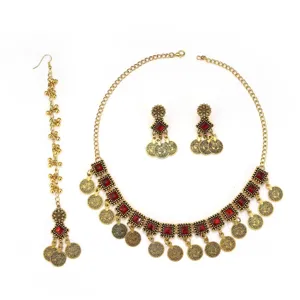Bohemian ethnic jewelry set featuring a gold-tone choker necklace, matching earrings and tikka.