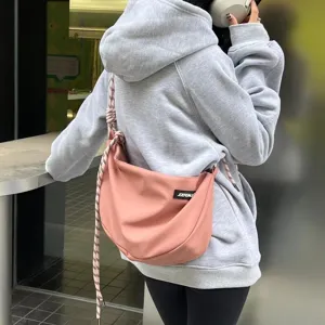 Stylish oxford cloth crossbody dumpling bag for women, lightweight casual shoulder bag.
