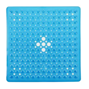 Blue non slip bathroom mat detail, suction cups and drainage holes for secure shower safety.