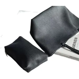 Minimalist black soft leather tote bag set for women, casual slouchy shoulder bag daily.