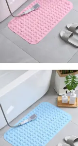 PVC anti-slip bathroom mat with suction cups and massage points for shower room use.