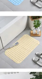 Anti-slip PVC bath mat with massage suction cups for bathroom shower floor safety use.