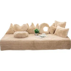 Thick plush bay window cushion tatami mat set with cute shaped pillows for home decor.