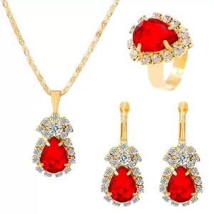 Detailed shot of luxury gold-plated red teardrop crystal necklace ring earrings jewelry set.