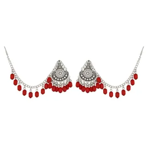 Bohemian ethnic silver-toned red bead dangling earrings with hair chain detail design.