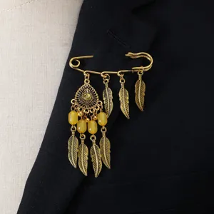 Bohemian retro gold feather brooch pin elegant alloy tassel jewelry detail shot for women