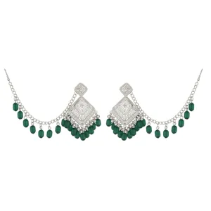 Indian ethnic silver earrings with green beaded tassels and intricate carved geometric drop.