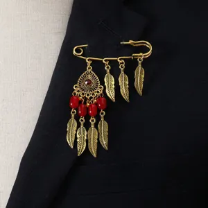 Vintage boho feather safety pin brooch, antique gold statement lapel pin for women.