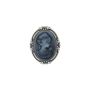 Vintage cameo brooch detail, classical Victorian lady profile relief, elegant silver tone frame.